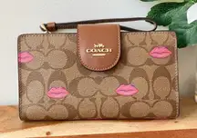 NWT COACH TECH WALLET IN SIGNATURE CANVAS‎ WITH LIPS PRINT
