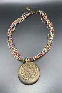 ColdWater creek 6 strand multi colored seed bead necklace wood/bronze pendant