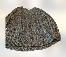 open cable knit sweater.  This long sleeved sweater is size La…