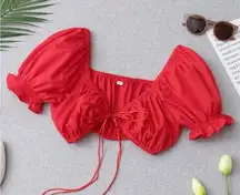 NWOT red cropped top with front tie and ruffle puff sleeve size small