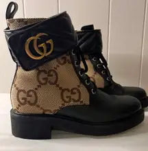 Like New  Monogram Combat Style Boots 7.5 RUNS VERY LARGE