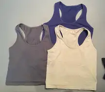 3 Cotton cropped racer back cotton tops.‎ 3 colors. Size Medium