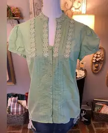 Caribbean Joe cotton button down top with cap sleeves, pin tucks & lace trim.