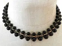 Black beaded brass tone collar necklace