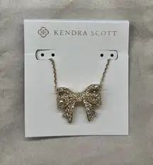 Kendra Scott Krista Gold Bow Short Pendant Necklace in White Mix