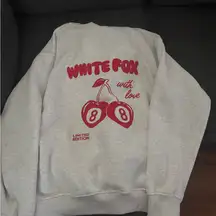 White Fox Gray Sweatshirt with Red Cherry Design