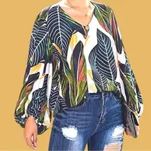 Cute slip over blouse with puffy sleeves, vneck.