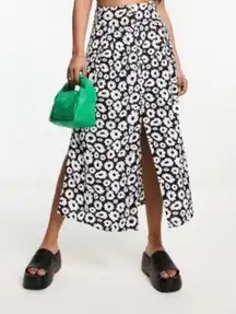 COPY - ASOS DESIGN button through midi skirt with split in mono daisy print