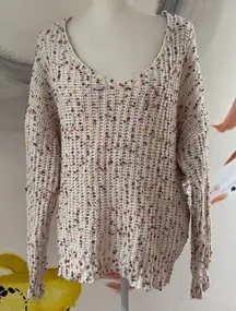 Main strip oversize sweater.  Off the shoulder.  Size Small. Twist back.