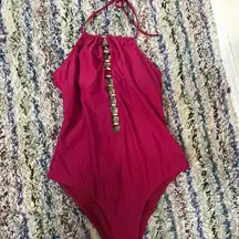 Bebe magenta cutout one piece swimsuit size large