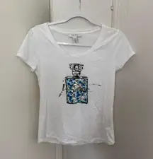 White House Black Market White T-Shirt with Floral Perfume Bottle Design