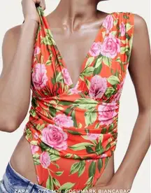 NWT •  Floral Bodysuit