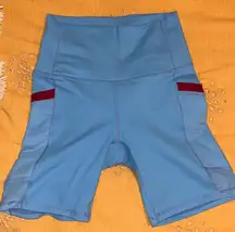 Fabletics powerHold blue biker shorts