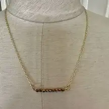 Gold tone copper bead bar necklace