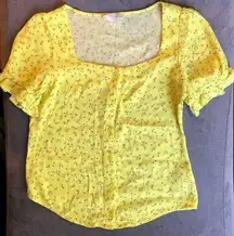 Elodie S yellow square neck button up top with purple tiny flowers puff sleeve