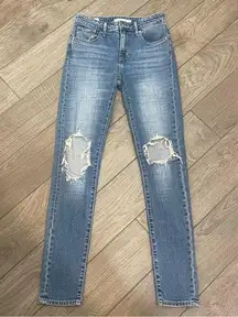 Levi 721 High Rise Ripped Skinny Jeans