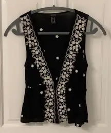 Plunging embroidered peplum style tank