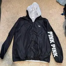 Black zip up rain jacket never worn with hood