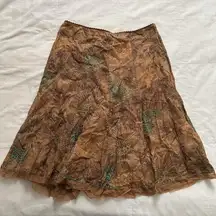 Elie Tahari tan patterned midi skirt with teal beaded detailing floral pattern