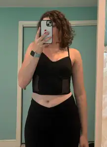 black crop top with mesh cut outs