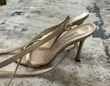 Ankle strap heels in good condition minor signs of wear noted.