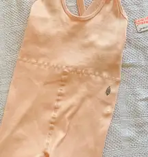 Free People Movement Peach Ribbed onesie M/L