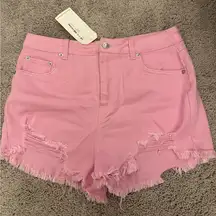 pink denim distressed shorts