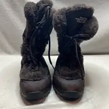 The North Face goose down lined lace up brown boots size 9.5