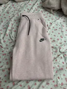 pink nike tech pants 
