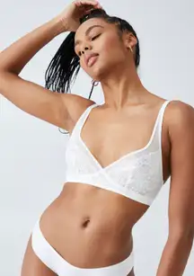 Body white lace bralette, brand new with tags.