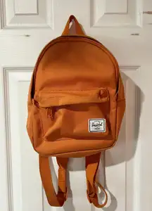 Herschel mini orange backpack