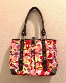 Mint NWOT  shoulder bag. Vibrant floral fabric with brown leather straps. Sz 15x10