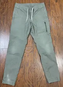 VUORI Womens Green Jogger Pants Drawstring Waist Casual Zip Pocket Tapered leg