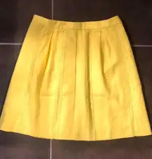 NWOT canary yellow  mini skirt. Sz 00.