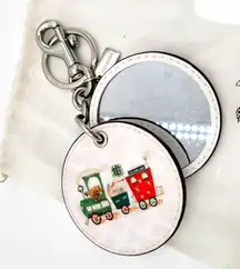Coach Mirror Bag Charm Mirror Bag
Charm In Signature Canvas With Train