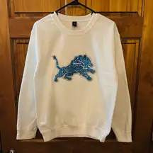 Detroit Lions sweatshirt! NFL white sequin bedazzled logo crewneck size large!