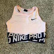 Nike Pro Intertwist baby pink athletic top