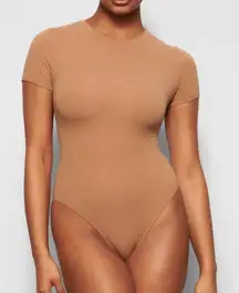 NWOT SKIMS Raw Edge Hem Thong Body Suit