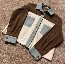 Colorblock corduroy jacket with functioning buttons.