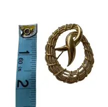 Vintage Trifari filagree brooch