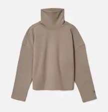 The Turtleneck Sweatshirt Cream Color Size is Small