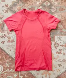 pink tight athletic t-shirt