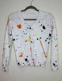 Decker Luxe Colorful Paint Splatter V-neck Distressed Trim Sweater in White - XS