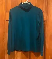 L.LBean women’s  teal turtle neck size large .