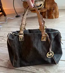 Michael kors grayson handbag - small pen marks in pics