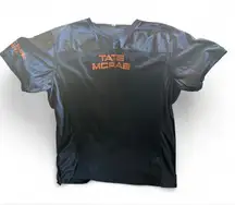 Black and orange women’s Tate McRae jersey