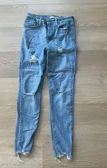 721 Levi’s High-Rise Skinny Jeans Distressed