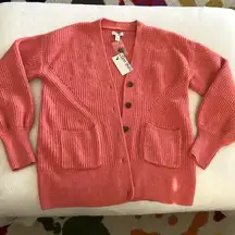 New  sweater, button open front, size small