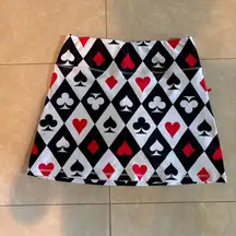 Never been worn activewear skort with spades, hearts, diamonds and clubs printed