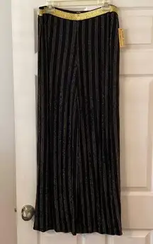 Melissa Paige Pants size L brand new with tag color black with golden design